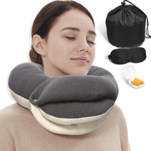 A woman with a neck pillow and an eye mask.