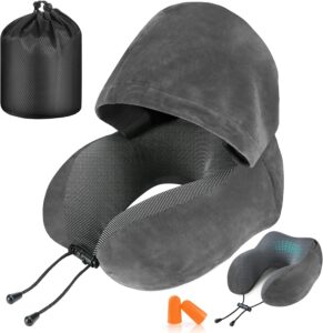 A travel pillow with earplugs and a bag.