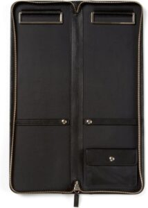 A black leather suit case with two compartments.
