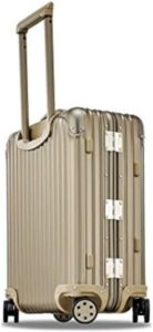 A beige suitcase with wheels on a white background.