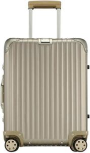 A suitcase with wheels on a white background.