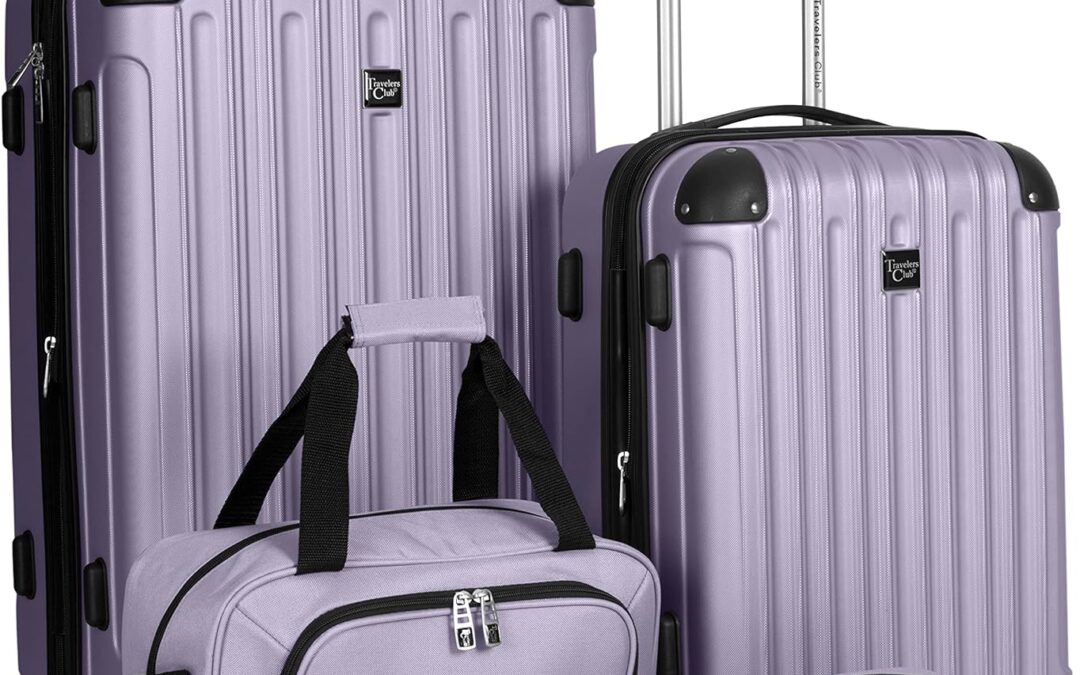 Four pieces of purple luggage with handles and wheels.