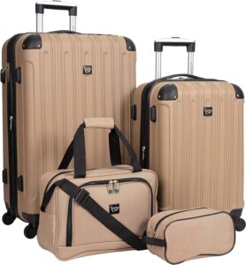 Four pieces of tan luggage with handles and wheels.